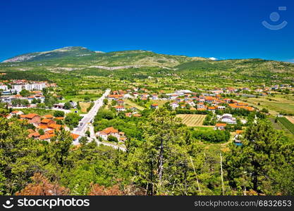 Petrovo Polje and town of Drnis view, green landscape of inland Dalmatia, Croatia