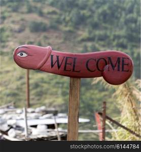 Phallus welcome sign, Sopsokha Village, Punakha, Bhutan
