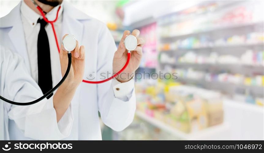 Pharmacist working with another pharmacist in the pharmacy. Healthcare and medical service.