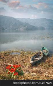 Phewa Lake - the second largest lake in Nepal located in the Pokhara Valley near the town and the mountain Sarangkot.