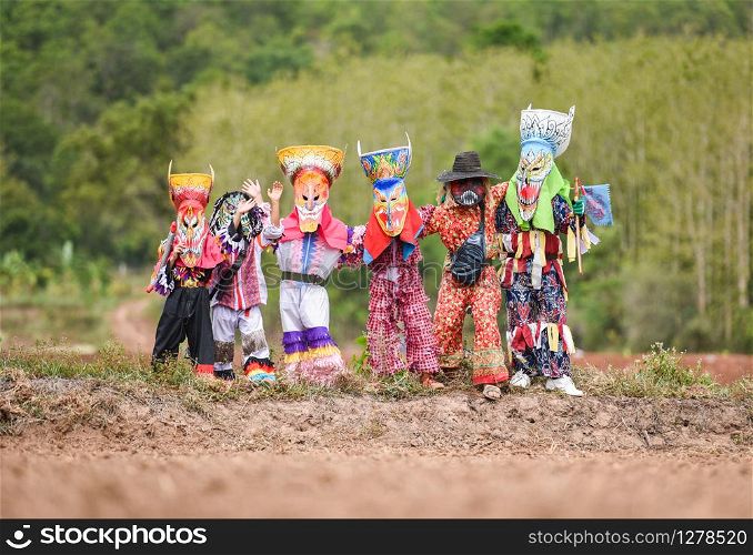 Phi ta khon festival ghost mask and colorful costume fun traditional thailand mask the show art and culture loei province Dan Sai thailand festival / phi ta khon or halloween of Thailand
