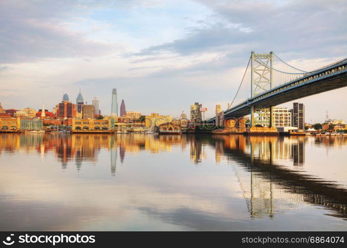 Philadelphia cityscape at sunrise with the Delaware river