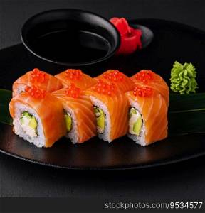 Philadelphia sushi rolls with caviar on plate