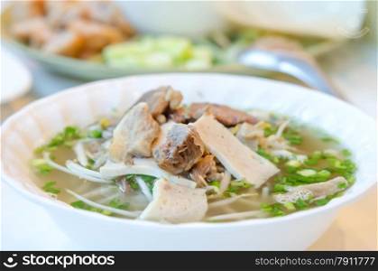 Pho Bo - Vietnamese fresh rice noodle soup with beef, herbs and vegetable