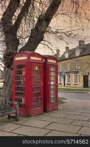 Phone boxes in the popular Cotswold village of Broadway, Worcestershire, England.