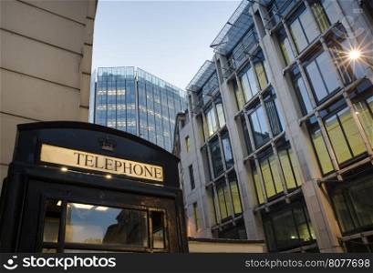 Phone cabine in City of London. Financial center of London