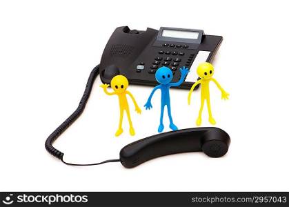 Phone support concept - smilie and telephone isolated on white