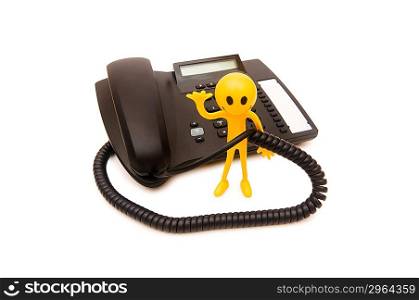 Phone support concept - smilie and telephone isolated on white