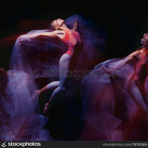 photo as art - a sensual and emotional dance of beautiful ballerina through the veil on a dark background. photo as art - a sensual and emotional dance of beautiful ballerina through the veil