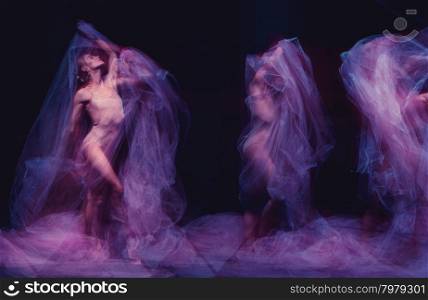 photo as art - a sensual and emotional dance of beautiful ballerina through the veil . photo as art - a sensual and emotional dance of beautiful ballerina through the veil on a dark background. A stroboscopic image of the one model