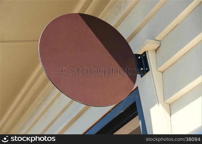 Photo blank mockup of street store vintage signboard on the old wooden wall.