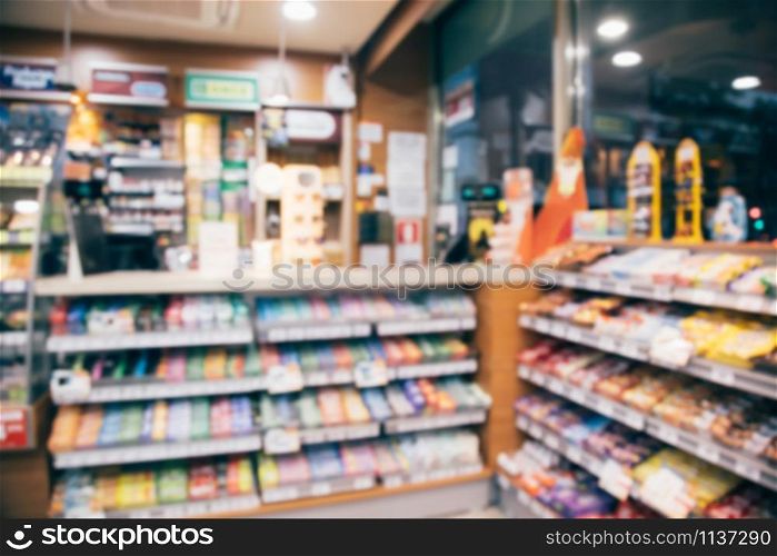 photo blurred Drink products Beverage soft drink bottles in supermarket refrigerator Variety of drinks on shelves in convenience store background. blur Leave copy space empty to write text