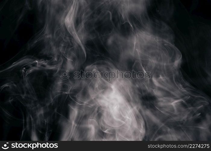 Photo Brown wavy smoke on black background. Resolution and high quality beautiful photo. Photo Brown wavy smoke on black background. High quality beautiful photo concept