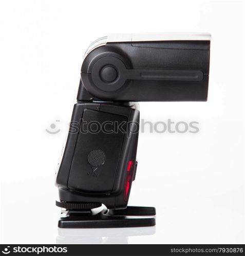 Photo camera flash isolated on white
