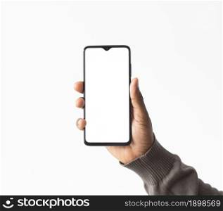 Photo Close up hand holding phone. Resolution and high quality beautiful photo. Photo Close up hand holding phone. High quality beautiful photo concept