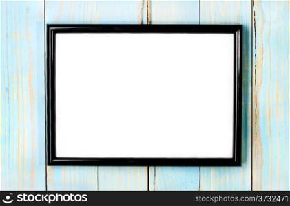 photo frame on wooden blue background
