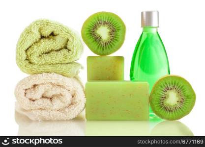 Photo if spa products with kiwi over white isolated background