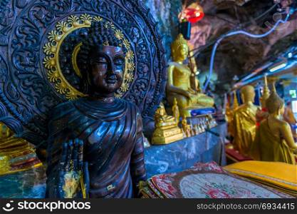 photo in Buddha temple in Thailand, close-up sculpture