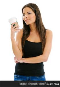 Photo of a beautiful brunette woman drinking a takeout coffee.
