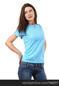 Photo of a beautiful brunette woman posing with a blank light blue t-shirt, ready for your artwork or design.