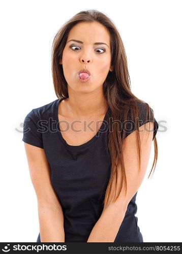Photo of a beautiful young woman sticking her tongue out and crossing her eyes.