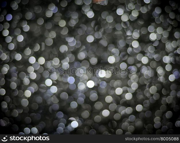 Photo of a Bokeh background. Festive elegant abstract background with bokeh lights.