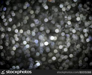 Photo of a Bokeh background. Festive elegant abstract background with bokeh lights.
