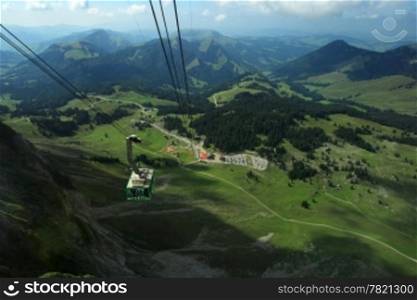 Photo of a cable car climbing to the top of Santis Mountain in Switzerland.