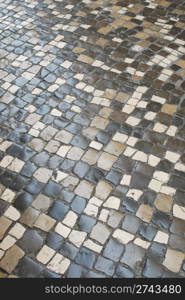 photo of a colorful pavement made of portuguese typical stones