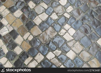 photo of a colorful pavement made of portuguese typical stones