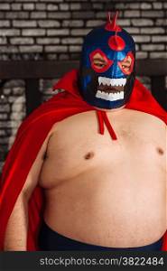 Photo of a large Mexican wrestler or Luchador posing.
