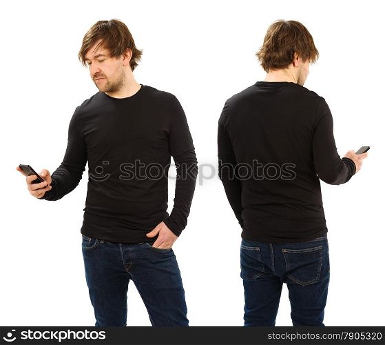 Photo of a man holding a smartphone and wearing a blank black t-shirt, front and back. Ready for your design or artwork.&#xA;