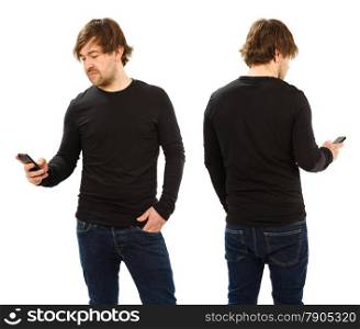 Photo of a man holding a smartphone and wearing a blank black t-shirt, front and back. Ready for your design or artwork.&#xA;
