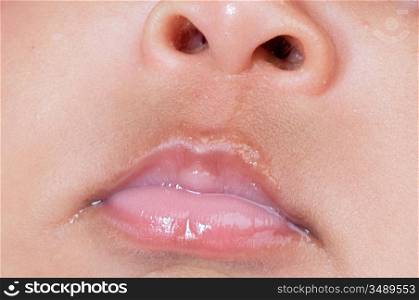 photo of a mouth of a new born
