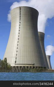 photo of a nuclear power plant chimneys active