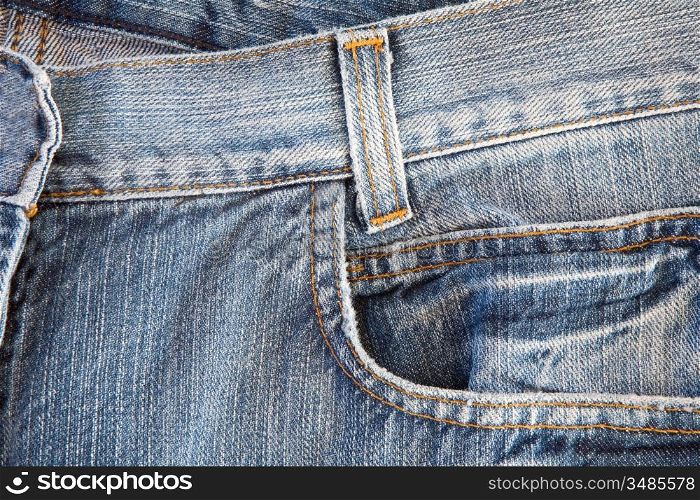 Photo of a pocket jeans with yellow thread