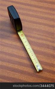 photo of a tape measure on the desk