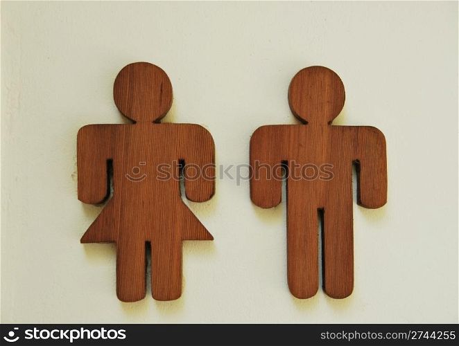 photo of a toilet wooden sign