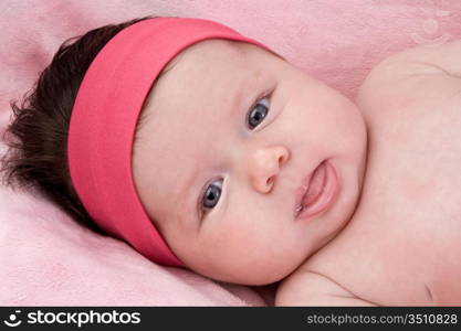Photo of adorable baby newborn with blue eyes