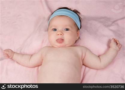 Photo of adorable baby newborn with blue eyes