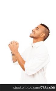 Photo of african man praying on the floor over white isolated background