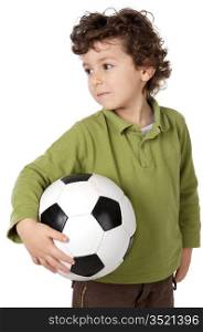 photo of an adorable boy dreaming about being soccer player