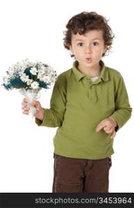 photo of an adorable boy with flowers and making trivialities a over white background