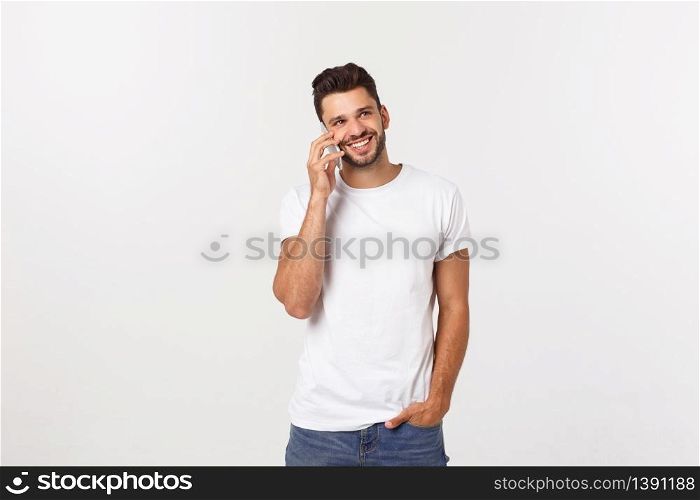 Photo of an attractive businessman posting over a white background. Photo of an attractive businessman posting over a white background.
