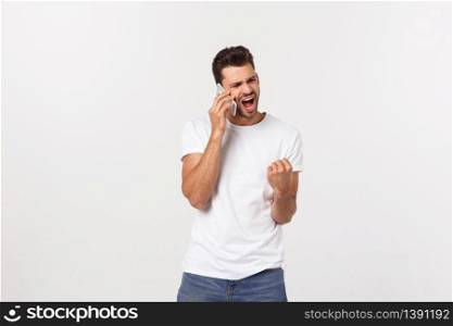 Photo of an attractive businessman posting over a white background. Photo of an attractive businessman posting over a white background.