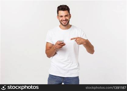Photo of an attractive businessman with his arms crossed and smiling over a white background. Photo of an attractive businessman with his arms crossed and smiling over a white background.