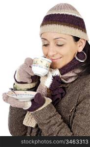 photo of an attractive lady sheltered for the winter drinking a tea cup