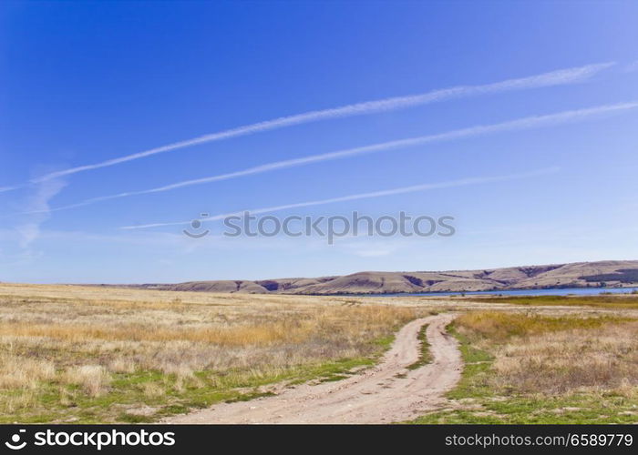 Photo of autumn landscape with blue sky