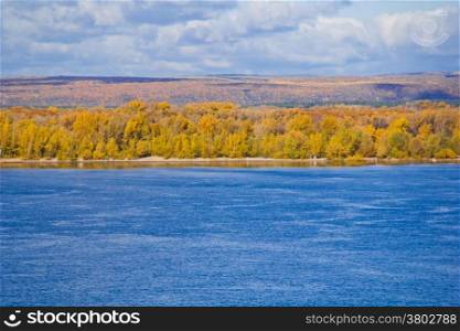 Photo of autumn landscape with forest and river