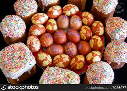 Photo of background with Easter eggs and Kulich